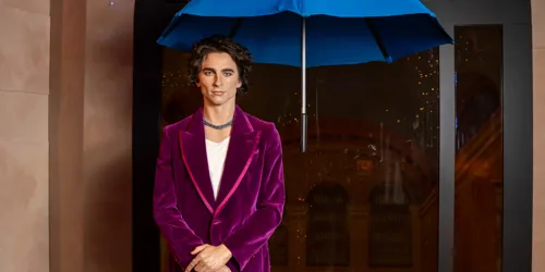 Timothee chalamet under an umbrella